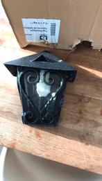 Zwarte antieke buitenverlichting, Ophalen