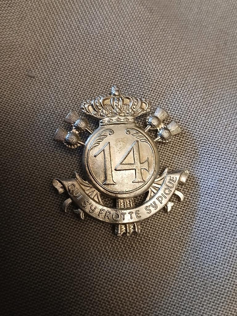 Insigne 14 Li argent, Enlèvement