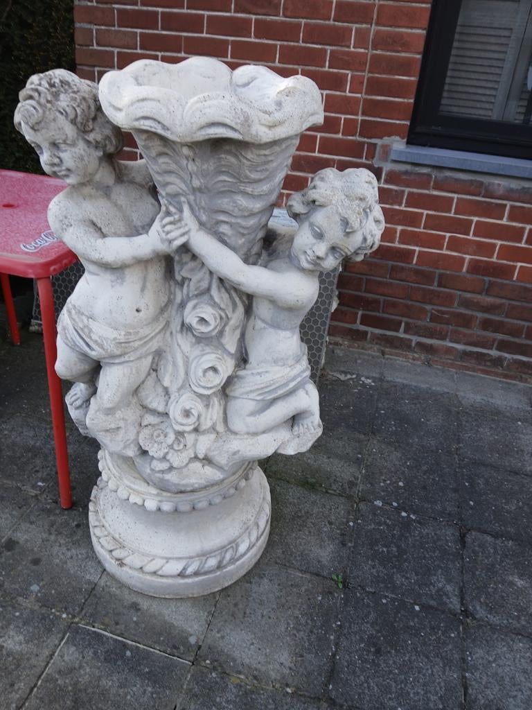 Groot betonnen tuinbeeld, Ophalen